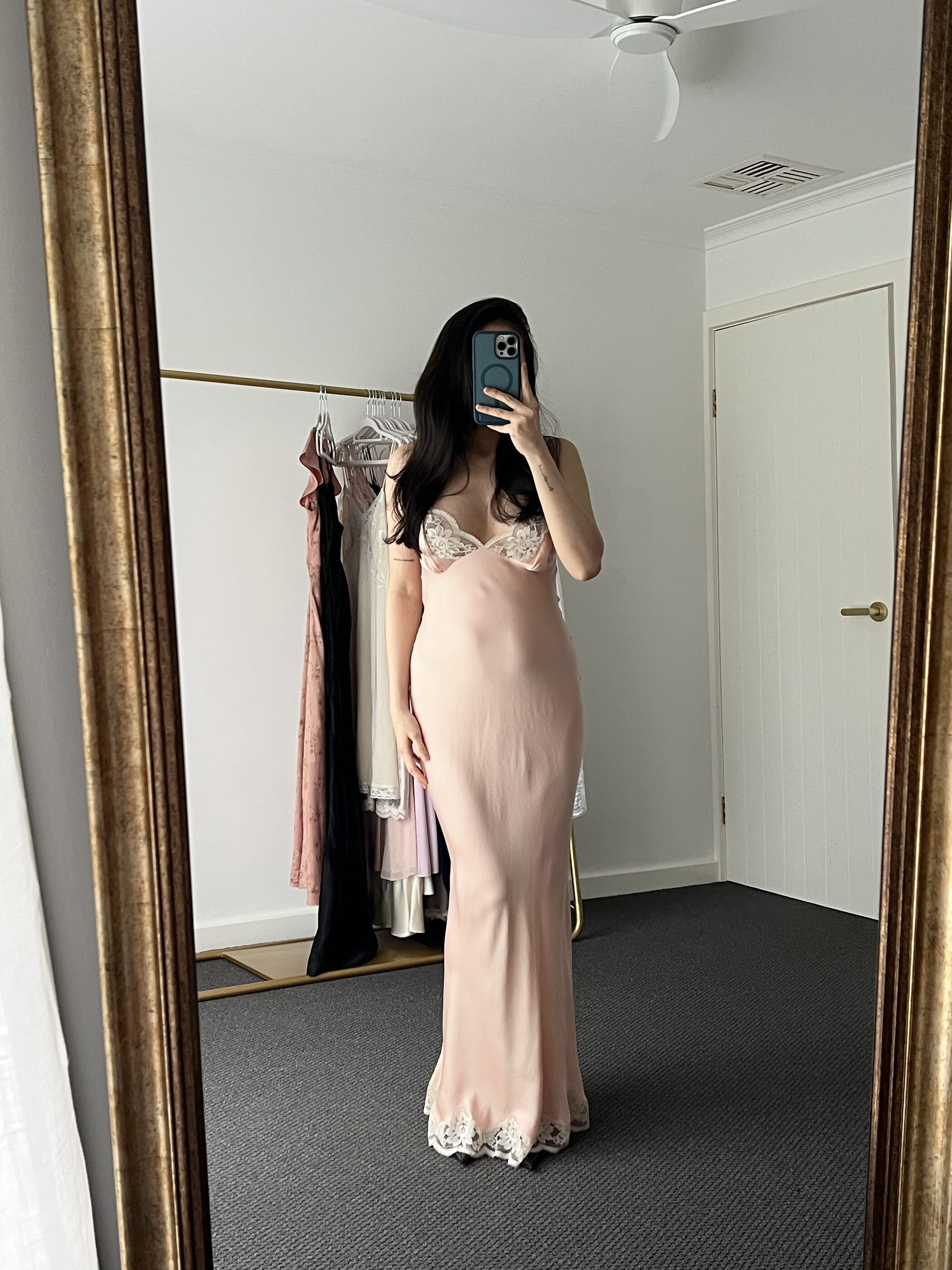 The deep lace hem, with a small pull at the left